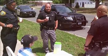 9-year-old Gracen Newbauer sat outside in the hot sun for nearly 2 weeks as he worked to raise money through a lemonade stand. Gracen was set up near his home in Brooklyn Park, Minnesota and raised $20 over the course of those 2 weeks. 

This young entrepreneur sets his stand up nearly every summer and he knows it’s a great way to raise some money on a hot day. But all his hard work was almost ruined when a group of older kids on bicycles came by Gracen’s lemonade stand. “One of them just took the glass and then they just started riding their bikes away.” Gracen called his dad, Mark Newbauer, who suggested that the boy call the police to report the incident. 

Mark thought that the officers would probably be too busy for his son, but everyone was surprised with what happened next. Officer Alyssa Archer of the Brooklyn Park Police department responded to the call. She asked Gracen some questions about the incident and then she handed him $20 from her own pocket to replace that money that had been stolen. But the kindness didn’t stop there. 

All throughout the day, officers who had overheard the call stopped by Gracen’s lemonade stand to help support the young boy. Altogether, they bought more than $50 in lemonade. This is truly a remarkable act that Gracen is going to remember for a lifetime. And he’s only made it a point to be more careful about the money he earns for his lemonade stand. 