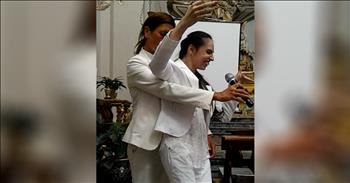 When you have talent and a dream, there’s truly nothing that can hold you back. It’s always incredible to watch people follow their passion and live out their best lives. 29-year-old Alfina Fresta is the perfect example of following your dream, no matter what the rest of the world says. 

Alfina has Cerebral Palsy and many people think that limits your entire life. But Alfina is proving all of these people wrong in the best way possible. This incredible woman has a voice like no other and when you hear her sing, it will absolutely blow you away. 

The Sicilian woman is affected by spastic dystonic tetraparesis and is visually impaired but none of these things has stopped her from sharing her beautiful voice for all the world to hear. Recently, Alfina performed at the Sicilian Festival of the Family in Etna, Italy and her powerful performance was seen all over the Internet. 

Now, she’s back for another performance and it’s even better than the first. Just listen as Alfina stands up and belts her heart out to this moving tune. She is assisted by Stefania Licciardello who helps hold her up during the performance. 

I think everyone in the audience was stunned by this incredible voice and I felt the exact same way. There is so much talent and skill in her voice and it’s one you have to hear to believe. I sure hope we get to hear more from this amazing woman. Who else is in awe of this beautiful voice? 