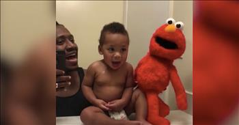 Dad Entertains Baby With Spot-On Elmo Impersonation
