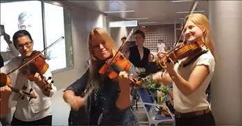 Passengers at Geneva Airport were recently treated to an unplanned musical performance. Performing a piece from Vivaldi’s Four Seasons, the members of the Geneva Chamber Orchestra decided to cheer up the airport. The group  found themselves stranded at the airport due to a flight delay. Seeing that their wait would be a while, the musicians naturally took out their instruments. They took the unexpected time, waiting for their flight to Venice, to give the other waiting passengers an impromptu concert.

Violinist Fabrizio Von Arx led the musicians as they passionately played through the selected upbeat classical piece. With smiles and laughter, the musicians were pleasantly surprised at the passengers who stopped to watch them play. With haunting acoustics under a stairwell of the airport, the music flowed freely through the space. If you’ve ever had the pleasure of waiting in an airport, especially for a delayed flight, we think you will great appreciate this stairwell concert! Classical music has been proven to make the listener smarter, perhaps it also makes them calmer! We found this so soothing and would love to experience such a wonderful concert in such a stressful place as an airport! 

The video was originally posted by Pascal Bitz, a photographer from Geneva. With the caption “This is what happens when classical musicians wait for a delayed flight at 10:00pm” Pascal shared the now viral video. We don’t think he expected the video to travel around the world as quickly as it has! What a blessing that he was there at the same time as this talented group of musicians and was able to film their mini-performance! 
