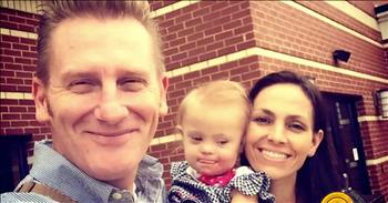 It’s hard to believe that it’s been two years since beloved singer Joey Feek lost her battle with cancer. Now, Rory Feek, her husband and  the other half of the country duo is opening up about his life today, and how Joey’s legacy is living on!

Joey Feek was filled with such talent and joy. Her friends, family and fans were stunned to learn that this vibrant soul would lose her battle with cancer and they mourned the loss of this powerfully inspirational woman. She seemed to take everything that life dished at her in stride. She had a gift for positivity and remaining grateful for the blessings in life.

 When Joey and Rory Feek first learned that they were expecting their first baby, they took a little break from performing to concentrate on their family. Soon after, their daughter, Indiana, was born with Down syndrome. And shortly after that, Joey was diagnosed with cancer. She would sadly pass away at just 40 years old. 

But their love story would still have another chapter, as Rory would continue to find ways to honor his late wife. The farm where they made their home would be used to inspire a whole new generation.

“It’s beautiful and tragic at the same time. But the beautiful outweighs the tragic,” Rory shared.

In this candid interview at the couple’s farm, Rory shares about Joey’s legacy and and how Rory is excited to share the success of the schoolhouse he had built on his property for children with all learning abilities.

When asked what he thought Joey would say about what he had done with the property he said, “She would say my husband is crazy. Good job.”
