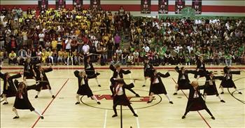 Dancers from the PAC Dance Team and Advanced Dance at Walden Grove High School have outdone themselves in this epic Homecoming Halftime routine. The group performed a thrilling six-minute Harry Potter themed routine and wowed their fellow students. The dance was posted on social media and has since gone viral! 

The use of mobile set pieces helps to recreate the entire Harry Potter story from the time he’s accepted into Hogwarts through a duel with villain, Voldemort. The opening scene has Harry taking the stairs to his new school which is then stunningly swirled around like a whirlwind ride by other cast members. Entering from the corner of the gym floor is a creative “Hogwarts Express” train full of excited students.  Hysterically, Harry tries on the hat which will tell which “house” he will join. As Gryffindor is called out the music changes and the team breaks into a choreographed dance.

Next up is Harry’s flying lessons. Each member of the dance team has stealthily grabbed a broomstick for the scene. Breaking into another tight dance number, the team shows their skills as a group as they “fly” through the center of the court. It’s clear that they have truly worked long hours to accomplish these synchronized moves!

As the villains enter through smoke, the students are wowed by entrance. It’s not long before the good vs evil begin a dance battle. It appears the villains have won this battle, but just when it seems hope is lost, Harry jumps up and defeats ultimate bad guy, Voldemort!

These kids are incredibly talented dancers and their creativity is such a pleasure to watch! Even if you are not a fan of the Harry Potter series, seeing them perform this good vs evil battle in such a unique way is true enjoyment! 
