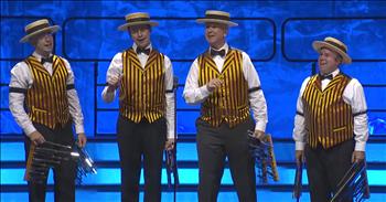 Calling all lovers of Disney music! You’ll want to listen to the Humdingers Barbershop Quartet as they sing a unique medley of beloved Disney songs. These harmonizers Performed live during the Saturday Night Spectacular for  the 2018 Barbershop Harmony Society International Convention.

The dapper gents were dressed up in traditional looking barbershopper costumes, complete with colorful vests and boater hats right down to the white spats over their shoes. Most notably seen, and most non-traditional for this style of music, are the unique looking instruments they each were utilizing during the performance. Each member of the quartet held one in each hand and the sound would ring out as they shook them much like a handbell!  Of course, we had to know what these mysterious looking instruments were! They are called “Deagan Organ Chimes” and look similar to cut-down organ pipes mounted on a board of wood. The sound is produced when the instrument player shakes the chime. It reminded us a little bit of the sound of a steel drum or a marimba (similar to a xylophone). Those most familiar with barbershop quartet competitions will know instruments other than voices are not traditionally used, so this added a fun and unique experience to their performance.

The playful medley of popular Disney tunes had a very recognizable line up. Songs featured included everything from “Zip-a-Dee-Doo-Dah” and “Whistle While You Work” to “It’s a Small World” and the Mickey Mouse Club theme song. Some comical choreography coupled with a little tap number round out this creatively performed toe tapping routine. Thanks to these catchy classics, which of these Disney tunes will get stuck in your head today? 