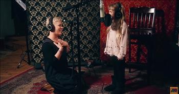 We just love seeing famous parents sing with their talented kids. Andrea and Matteo Bocelli took the internet by storm with their duet, Fall on Me. And now pop star Pink just warmed our hearts by singing with her daughter, Willow Sage. The duo, aged 39 and 7 years old, made a heartwarming video while performing a song from the hit musical, The Greatest Showman.
 
The two are among an all-star lineup of celebrities lending their voices to the new album, "The Greatest Showman — Reimagined." The original musical film was released in 2017 and starred Hugh Jackman and Michelle Williams. It told the story behind how showman P.T. Barnum created the Barnum & Bailey Circus, and the music in the film because an instant classic.
 
In this behind-the-scenes video, young Willow sings her little heart out while proud mama, Pink, looks on encouragingly! Then Pink joins in and her strong, soaring vocals are just perfect for the epic ballad, “A Million Miles.” After Willow finishes her part, her happy mom flashes her the double thumbs up sign.
 
The sweet mother-daughter duo are in really good company on the new album, which also features Pentatonix, Sara Bareilles, Kelly Clarkson, and the Zac Brown Band. 
 
If you love the music from ‘The Greatest Showman’ as much as we do, make sure to check out this article featuring our 10+ Favorite Cover Videos from ‘The Greatest Showman’!
