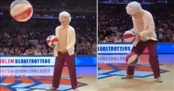 Fans at a New York Knicks game were shocked when this Granny surprises the crowd with amazing trick moves. During the halftime show, Harlem Globetrotters brought a fan and this “Granny” onto the court for a audience contest. Little did they know that this little old “Granny” wasn’t all she seemed to be. 

As the random fan tried to copy the Globetrotters trick moves, he was shocked as Granny easily picked up the ball and began dribbling with skill. Slowly rolling the ball behind her head, she asks for a second ball and begins dribbling them at the same time. Clearly she was not your everyday Granny! 

That’s when Granny breaks the act and begins to strip off her costume to reveal a Harlem Globetrotters uniform! With the help of a team mate she pulls off her granny mask to reveal it’s none other than Briana Green. She is one of only 15 women to join the 92-year-old trick team! With incredible skill, Briana showed why she is known as one of the Globetrotters best “handlers”. Clearly she has spent years perfecting her trick moves!

It just goes to show - never judge a book by it’s cover! Who would have thought that sweet, little old Granny was going to school everyone on the court! Of course, this granny wasn’t actually what she seemed. There are many true elderly former ball players who still have some impressive skills and can sink shot and shot at the hoop. We hope they are showing off to their grandkids every day! 