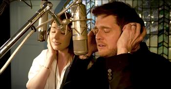 Michael Bublé had a dream to perform “Help Me Make It Through The Night” as a duet, but had to find just the right vocal partner. After hearing her sing as the voice of Jenny Lind in “The Greatest Showman”, Michael Bublé knew he found the right singing partner in Loren Allred.

“Take the ribbon from my hair / Shake it loose and let it fall / Lay it soft upon my skin / Like the shadows on the wall"

Originally a country ballad from the 1970s, “Help Me Make It Through The Night” lends itself perfectly to Bublé’s crooner charms. Knowing he wanted to sing the song, Bublé had to find the right vocal partner.

“My concept had always been so strong. And in my head, it was always a duet, I never heard it as a duet before but I had always seen it as this incredible sad, but beautiful story of two needy people who just did not have the strength to be alone any more.” Bublé shares about his vision for the song.

“I had been watching a movie called ‘The Greatest Showman’...and I realized the actress, it wasn’t her singing, so I frantically started to comb Youtube to find out who this was… and I found Loren Allred!”

If there is such a thing as a vocal crush, Bublé admits he has it (we do, too!) Loren’s voice is truly amazing and hearing her sing this beautiful ballad, there is no doubt that her voice was perfect for the part! Allred hails from Utah, the daughter of two talented vocalists. It’s clear that she inherited their skill. We can’t wait to hear more from her and hope that she and Bublé will continue to use their vocal gifts in duets together!