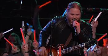 Chris Kroeze brought the crowd to their feet with his rendition of ‘Sweet Home Alabama’ during The Voice finals. The 27-year-old Wisconsin native made a splash with during his blind audition of Stevie Ray Vaughan's "Pride and Joy." 

Ultimately, this country crooner joined Team Blake and he’s been knocking out the competition for weeks. Along the way, he’s given us memorable performances such as his cover of Creedence Clearwater Revival's "Have You Ever Seen The Rain?" and The Beatles’ “Let It Be.” But today’s performance may have just put him over the top. 

It’s been nearly 40 years since Lynyrd Skynyrd first released ‘Sweet Home Alabama’ but it still remains a country favorite by millions. You can’t mistake that opening beat and iconic first line.

‘Sweet home Alabama
Where the skies are so blue
Sweet home Alabama
Lord, I'm coming home to you’

Kroeze confidently stepped on stage with his guitar and put his own spin on this classic. Back by a talented band, Chris was able to showcase his skilled vocal range and powerful stage presence. As the crowd waved red, white and blue glow sticks, Kroeze seemed right at home in the spotlight. This family man has truly come a long way on his journey to the finals and it’s obvious that all his hard work is paying off. With only a few more performances to go, this young man is definitely a contenter. Do you think Chris Kroeze and Team Blake have what it takes to win the whole competition this year?