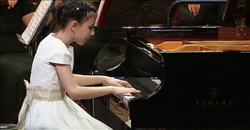Your eyes will be amazed when you see this 10-year-old child prodigy beautifully play the piano. Alexandra Dovgan started to study piano at the young age of 5. It was obvious that this girl had incredible talent as she continued her studies. Before too long, Alexandra started to gain recognition for her gift and even won various awards and competitions. 

This particular clip is from the 2018 Grand Piano Competition. Alexandra is effortlessly playing ‘Concerto for Piano No. 1 in G Minor, Op. 25’ from Felix Mendelssohn-Bartholdy. Just watch as she furiously glides over the keys with such passion. Her hands are moving so fast, that I can barely keep up. Somehow, this young girl makes every single note seem easy. 

I know that it takes so much time and practice in order to perfect these numbers but Alexandra shows no signs of difficulty. In fact, she won the entire competition with this piece. It always amazes me to see children stepping on stage and performing just like an adult, or even better. When we see kids, we don’t expect them to be at the same level as an older performer. 

But sometimes, a child with a rare gift emerges and completely blows everyone away. In this case, Alexandra isn’t just a skilled pianist; she is one of the best, regardless of age. We all know how much time and practice it takes to become a professional and when we see a young person who’s only been on this Earth a few years with such talent, it’s very special. 

I hope that Alexandra continues to follow her passion and play the piano so that all of the world can hear her beautiful gift.