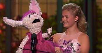 14-year-old Darci Lynne Farmer earns a wildcard for another shot at winning America’s Got Talent: The Champions. This teen ventriloquist quickly shot to fame after winning the twelfth season of America’s Got Talent in 2017. After earning the coveted golden buzzer during her first audition, Darci Lynne easily won over the hearts of America with hilarious routines combined with a talented singing voice. 

She introduced us to characters such as Petunia, Oscar and Edna. Week after week, she blew everyone away with her ability to sing difficult songs while operating the puppets. So, it’s no question why she was invited back to compete on ‘America's Got Talent: The Champions.’ This special format features 50 contestants who have won or been featured on previous editions of the show. These competitors come from all over the world and now they’re all vying for the ultimate winner’s title. For her first performance, Darci Lynne brought her friend Oscar along and they sang a duet of “Nutbush City Limits” and “Proud Mary.” 

Unfortunately, the teen did not advance to the next round. She was crushed to find out that her dreams of becoming the champion were over. But then, she received a call that she was going to be a wildcard contestant on the show and have another chance. Today, Darci Lynne is pulling out all the stops as she belts out the Italian opera song “O Mio Babbino Caro” with her puppet, Petunia. 

The judges were in awe of the big voice coming from this talented teen. It was definitely a side of Darci Lynne no one has seen before. Judge Simon Cowell said, “I actually believe this, for so many reasons, is your best ever performance.” After this song, I definitely think Darci Lynne is a real competitor. 