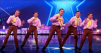 It was an adorable audition when 5 Irish boys performed the popular country song “I Just Want To Dance With You” on Ireland’s Got Talent. The Wee Daniels are a Daniel O’Connell tribute group and they’re winning the crowd over with their precious song and dance. 

Daniel O’Connell is a beloved Irish singer who rose to fame in the early 90s. His hit song "I Just Wanna Dance With You" brought him worldwide attention. The tune was even covered by US country artist George Strait in later years. Now, these five boys are putting their own spin on this iconic tune and the judges are loving every minute. Just watch as they belt out the familiar lyrics as they sway along to the beat.

“I want to dance with you, twirl you all around the floor
That's what they intended dancin' for,
I just want to dance with you.
I want to dance with you, hold you in my arms once more,
That's what they invented dancin' for,
I just want to dance with you.”

The boys are donned in matching outfits and they all perform some of O’Connell’s signature moves on the stage. Ireland’s Got Talent is definitely a big accomplishment and these young men should be so proud of themselves. 

I just love how they put their all into this performance and some of their moves earned some big applause. What did you think of The Wee Daniels and their tribute performance? They certainly made a great impression with this audition.