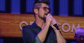 Christian vocalist Jason Crabb steps onto the Grand Ole Opry stage for a beautiful rendition of ‘He Stopped Loving Her Today.’ Country superstar George Jones originally performed this iconic song in 1980. The power ballad catapulted Jones to the top of the charts and began his lasting legacy in country music. The lyrics tell the story of a man who continued to love one woman his entire life. Even though they were never together, he kept notes and letters and hoped that she would come back into his life. But one day, he stops loving her and that was the day that he passed away.

“He stopped loving her today
They placed a wreath upon his door
And soon they'll carry him away
He stopped loving her today”

Today, Jason Crabb is at the Grand Ole Opry and he’s performing this George Jones classic. Jason was the lead singer of The Crabb Family band before they retired in 2007. Now, Jason is a Grammy award-winning solo artist leading the way with songs such as ‘Love Is Stonger’ and ‘The Song Lives On.’ 

This stage is an incredible platform for Jason to share his gift with the world and he’s definitely got a voice that you need to hear. Over the years, Jason Crabb has given all the glory to God and He continues to use his talent to sing of God’s praises. Now, we’re hearing his voice in a whole new way and it’s absolutely amazing. Who else remembers hearing this song for the first time?