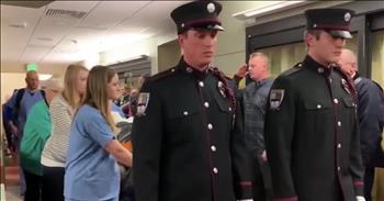 It was an emotional moment captured on camera as this deceased firefighter receives a hospital escort on the way to donate his organs. 31-year-old Cody Mooney was a firefighter with South Metro Fire Rescue in Colorado. 

Two years ago, he was diagnosed with an aggressive form of brain cancer. After a hard battle, Cody underwent surgery in February. But complications led to the young man passing away. Sadly, he leaves behind his pregnant wife and four children. But even in death, Cody is continuing to save lives. As an organ donor, this firefighter has the opportunity to enrich countless more lives for those waiting for a transplant. After he took his last breath, Cody was wheeled out of his hospital room to the transplant center. 

During this journey, fellow firefighters and hospital staff lined the hallway to pay their respects to this inspiring man. There were plenty of tears as Cody’s wife walked alongside her husband for one last time. Even though he may no longer be with us on this earth, we can take comfort knowing that Cody is safe in the arms of the Lord. And this beautiful tribute during his last moments is the perfect way to show respect and admiration for this incredible man. We thank you for your service and you’re continued effort to save the lives of others. 

Revelations 21:4 "He will wipe every tear from their eyes. There will be no more death’ or mourning or crying or pain, for the old order of things has passed away." 