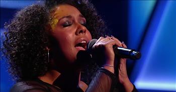 Bernadette earns a nearly perfect score on All Together Now with her powerful rendition of "It's A Man's Man's Man's World." 

This BBC show features a panel of 100 judges from the United Kingdom who all have a musical background. The panel includes performers, producers, and other experts in the music and entertainment industry. 

Once an artist starts performing, the 100 can turn their light on, stand up and sing along with the contestant. The person with the highest amount of lights from that round will move on in the competition. 

Bernadette sailed through the earlier rounds and now she’s in a sing-off. During this phase of competition, two contestants must each sing a song for the judges. 

The person with the highest score will automatically move on while the other will be eliminated. Bernadette wanted to make sure that her performance stood out so she went with a completely different song style than previous ones. 

“It’s going to be very different from what you’ve heard me sing before.” The panel was obviously impressed with her soulful rendition of "It's A Man's Man's Man's World" because one by one, they all stood up. 

In total, 99 out of the 100 judges pressed their lights for Bernadette. It is so rare to have a vocalist that connects with such a diverse panel of judges, but Bernadette did it with ease. 

This incredible performer is on her way to the finals and that is sure to be a song we don’t want to miss. 