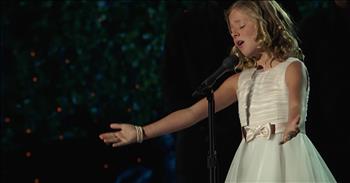 Viral voice Jackie Evancho performs a beautiful rendition of ‘The Lord’s Prayer’ during a classic clip from her Dream With Me concert. 

This young lady became a worldwide sensation after being crowned runner-up on the fifth season of America’s Got Talent. She was just ten years old when she made her appearance on the popular talent competition. Her classical vocals combined with high range made Jackie an absolute standout during the series. 

After her appearance on AGT, this opera voice continued to make a name for herself in the music industry. She even returned to her roots as a contestant on America’s Got Talent: The Champions. 

Jackie has performed all over the world to an array of adoring fans. Today, she is sharing a throwback clip from her Dream With Me concert tour in 2011. Jackie performs ‘The Lord’s Prayer’ and her opera voice is the perfect compliment to these holy words.

“Our father which art in heaven 
Hallowed be Thy name 
Thy kingdom come 
Thy will be done 
On earth 
As it is in heaven 
Give us this day our daily bread 
And forgive us our debts 
As we forgive our debtors 
and lead us not into temptation 
but deliver us from evil 
For Thine is the kingdom 
And the power 
And the glory forever”

Even though Jackie had never heard these words put with music before, she says ‘The Lord’s Prayer’ every single night before going to bed. 

It’s so special to hear such a talent belts out this sacred poem. I could listen to this all day. 