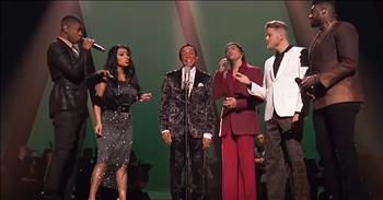 A cappella sensation Pentatonix joins forces with legendary singer Smokey Robinson for a performance of his hit song ‘Shop Around.’ 

This single was originally recorded in 1960 by Smokey’s band, The Miracles. It became an instant hit and went all the way to number one on the Billboard charts. It was even inducted into the Grammy Hall Of Fame in 2006. 

Today, Smokey is returning to the stage with the viral singing group that has taken over the world. Pentatonix formed in 2011, but they shot to fame after winning the third season of the television show ‘The Sing Off.’ Just listen as they belt out the lyrics to this iconic R&B song.

“Before you take a girl and say I do, now
Make sure she's in love with-a you now
My mama told me, you better shop around
Ooh yeah, a-try to get yourself a bargain son
Don't be sold on the very first one
A-pretty girls come a dime a dozen
A-try to find one who's gonna give you true lovin'”

Smokey Robinson and Pentatonix are both powerhouse vocal talents. When they combine their voices together, it truly creates an incredible live concert experience. 

It’s so amazing to see this timeless performer join forces with the next generation of music. This entire arrangement showcased the best elements of these sensations and I found myself toe-tapping along to the tune. 

Even though they may be decades apart, it feels like Smokey Robinson and Pentatonix were paired perfectly for this ensemble performance. What do you think?