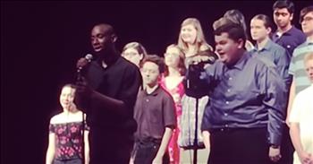 A talented teen with autism is belting out the lyrics to ‘A Million Dreams’ during a concert performance. 

This popular song is from the musical sensation, The Greatest Showman. The film was released in 2017 and starred Hugh Jackman and Michelle Williams. The award-winning movie told the story behind P.T. Barnum and how this showman created the Barnum & Bailey Circus. The music featured in the film because an instant classic. One of the most popular tunes is ‘A Million Dreams.’ 

The main characters, of P.T. Barnum and his wife, sing these beautiful words about chasing your dreams.

“'Cause every night I lie in bed 
The brightest colors fill my head 
A million dreams are keeping me awake 
I think of what the world could be 
A vision of the one I see 
A million dreams is all it's gonna take 
A million dreams for the world we're gonna make”

Today, Tommy is stepping up to the microphone for his very first solo. This young man was obviously excited to take on this iconic song and show off his vocal talent. Just listen as he passionately leads the choir in this inspiring show tune. Just like the message from the movie, Tommy is showing that nothing can hold you back from your dreams. 

If you have a vision and a dream in your heart, there is nothing that you cannot accomplish. What a perfect voice to sing the lyrics of this motivating and inspiring song. Who else is cheering for Tommy? 
