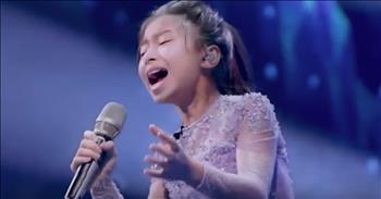 11-year-old Celine Tam returns to the Got Talent stage for a show-stopping performance of her original song ‘Who I Am.’ 

We first met this little superstar when she was just 9 years old. Celine competed on the twelfth season of America’s Got Talent and made it all the way to the semi-finals. As a big fan of Celine Dion, she chose ‘My Heart Will Go On’ for her audition. She easily earned four ‘yes’ votes from the judges. But it was her performance of ‘How Am I Supposed To Live Without You’ during the Judge Cuts that earned Celine a golden buzzer. 

Now, her incredible singing voice has taken her all the way to the World’s Got Talent stage and she’s competing against some of the very best acts in music and entertainment. And today, she’s singing an original song titled ‘Who I Am.’ 

This young artist wrote the lyrics all by herself and when she belts out this inspiring tune, you’ll be in awe. As she hit the high notes, the judges looked on with amazement and the crowd started to cheer. It was obvious that this young girl came here to win. After the song, one of the judges had rave remarks. “Celine, you are talented in music. I really appreciate your attitude, song lyrics and your passion for music.” 

That’s when she stood up and pressed the coveted golden buzzer to send Celine straight through to the live shows. What a well-deserved honor for this powerhouse vocal talent. 