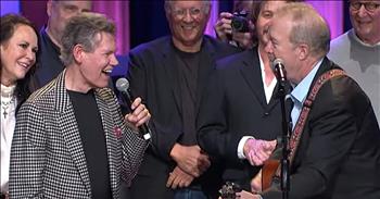 Country superstars join legend Randy Travis onstage for a touching performance of his hit, ‘Forever And Ever, Amen’ at the Grand Ole Opry. 

Randy Travis first broke onto the music scene in the 1980s. His deep and distinctive voice gave us hits such as ‘Deeper Than The Holler’ and ‘Three Wooden Crosses.’ But everything came to a screeching halt nearly six years ago when Randy almost lost his life after suffering a devastating stroke. It left him in a coma for 72 hours. 

Even though he couldn’t communicate, Randy could hear and understand everything that was going on around him. He even heard when the doctor’s advised his family that recovery was slim and they should consider pulling the plug. Thankfully, he was able to give his wife, Mary, a sign and from that moment on, he fought to recover. 

Today, the Grand Ole Opry is celebrating Randy’s 60th birthday with a star-studded tribute. The entire night concluded with a special rendition of his song ‘Forever And Ever, Amen.’ 

“Oh, baby, I'm gonna love you forever
Forever and ever, amen
As long as old men sit and talk about the weather
As long as old women sit and talk about old men
If you wonder how long I'll be faithful
I'll be happy to tell you again
I'm gonna love you forever and ever
Forever and ever, amen”

Country artists such as Charles Esten, Josh Turner, Charlie Worsham all stand on stage and belt out the iconic lyrics. And at the very end, Randy Travis steps on stage and sings the famous final note. What a birthday celebration. 
