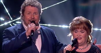 Viral sensation Susan Boyle performs ‘A Million Dreams’ on the Britain’s Got Talent finale with Michael Ball. 

We were first introduced to Susan when she appeared as a contestant on Britain’s Got Talent in 2009. After she stepped onstage, some people looked down on her outward appearance. But Susan easily changed their mind with her opera performance of ‘I Dreamed A Dream.’ That first audition completely changed her life. Even though Susan didn’t win her season of the popular talent competition, she became a household name and went on to sell millions of albums and tour the world. 

Michael Ball is another famed English performer notable for his work on the London play scene and Broadway. Today, they are coming together for an incredible duet of ‘A Million Dreams’ from the musical, The Greatest Showman. The award-winning film was released in 2017 and starred Hugh Jackman and Michelle Williams. It told the story behind P.T. Barnum and how this incredible showman created the Barnum & Bailey Circus. 

The movie is filled with original music that became instant classics. One of those notable tunes is ‘A Million Dreams.’ Susan Boyle and Michael Ball belt out these powerful lyrics on the Britain’s Got Talent stage during the grand finale. 

“'Cause every night I lie in bed 
The brightest colors fill my head 
A million dreams are keeping me awake 
I think of what the world could be 
A vision of the one I see 
A million dreams is all it's gonna take 
A million dreams for the world we're gonna make”

What an amazing rendition of this popular tune. Who else was singing along?
