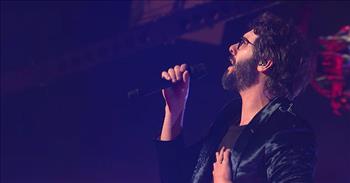 The talented Josh Groban gives an incredible live performance of his new song ‘Bigger Than Us’ at Madison Square Garden in New York City.
 
When he enters the stage at the beginning of the song, you can hear the loud cheers from his adoring fans. What an incredible opportunity it would be to see him perform live!
 
As soon as Josh Groban starts singing ‘Bigger Than Us’, you are immediately capitated by his extraordinary voice. He is such a great performer with such strong vocals. And the lyrics of this song have such power, too.
 
“I feel so small
With my hands up to the sky
I am reaching out tonight
'Cause this is bigger than us
I give my all
But it's just too much to hope
No I can't do this alone
'Cause this is bigger than us
Bigger than us”
 
The high energy in this video at Madison Square Garden is infectious. The full orchestra that fills up the stage definitely helps create such a great atmosphere for the show. Behind Josh, you can see a full string ensemble, drums, piano, electric guitar, and many other musicians that add to the fullness of the song.
 
God really blessed Groban with an amazing voice, and it’s no wonder why audiences around the world love to hear him sing. I also cannot help but to see this song through a spiritual lens when I hear the lyrics. Josh sings about facing battles in this song and reaching up to the sky, reaching to something bigger than us. 

We know that we can have hope during difficult times, because God is always with us. We don’t have to walk through the valleys of life alone. He is our stronghold; He is out firm foundation. And what a blessing that is!
