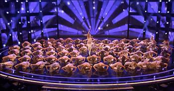 The talented Emerald Belles are back for another top-notch performance on America’s Got Talent. 

These Texas high kickers made quite the impression with their first audition on the popular entertainment competition. The Emerald Belles are a dance group comprised of 76 high school dancers. 

For decades, these talented ladies have shared their skilled dance routines all over the world. The Emerald Belles have performed at halftime shows, on cruises and even at Walt Disney World. Recently, they became viral sensations when a video of their award-winning routine from the 2017 Crowd Pleasers Dance Area Competition was posted online. 

The Emerald Belles performed a mesmerizing dance to “Sweet Dreams (Are Made Of This)” from the Eurythmics. That led them all the way to America’s Got Talent where they kicked up a storm. 

Now, they’re back for the live shows and ready to earn their spot in this competition. The dancers pulled out all the stops for this dazzling performance to a Britney Spears song. 

Not only do they include their famous high kicks, but they’re also added multiple difficult dance techniques to their routine. It definitely made for an impressive performance and almost all of the judges agreed. 

Simon Cowell said, “I believe you are ready now for a bigger stage. And I think Texas will root for you and America will root for you.” He also praised the group on their ability to showcase their individual personalities in such a large troupe. 

Do you think the Emerald Belles have what it takes to go all the way?