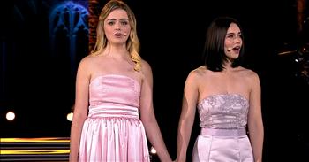 The talented woman of Celtic Woman perform a live rendition of the beloved classic ‘Over The Rainbow.’ 

This special song was made famous by Judy Garland in the 1939 film ‘Wizard Of Oz.’ Since that time, this tune has been covered by countless artists and cemented its place in history as one of the best, and most beautiful, songs of all time.

“Somewhere over the rainbow way up high
There's a land that I heard of once in a lullaby
Somewhere over the rainbow skies are blue
And the dreams that you dare to dream really do come true”

This incredible all-female group comes from the creators of Riverdance. Over the years, Celtic Woman has introduced millions to the sounds of Ireland and, in the process, become a global phenomenon. 

Their pure tones and hauntingly beautiful harmonies put them in a league all their own. Today, they are at the Johnstown Castle in Wexford, Ireland for a very special performance of ‘Over The Rainbow.’ Just listen as they belt out these iconic lyrics. 

“Someday I'll wish upon a star
And wake up where the clouds are far
Behind me
Where troubles melt like lemon drops
Away above the chimney tops
That's where you'll find me”

Time after time, Celtic Woman impresses us with their brilliant vocal performances. And hearing these two women put their heart and soul into singing ‘Over The Rainbow’ might be one of their best performances yet. 

What about you? What is your favorite Celtic Woman song?
