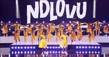 The talented Ndlovu Youth Choir performs a unique rendition of ‘Africa’ from Toto on America’s Got Talent. 

We first met this inspiring choir during their audition for the fourteenth season of AGT. The choir was created in 2009 as a creative outlet for kids in South Africa. 

Led by artistic director Ralf Schmitt, this talented group has gained a following all over the world. On their Facebook, it states that “the choir seeks to deliver an experience of infectious joy, a toe-tapping and energetic South African music ranging from Afro-Pop classics to traditional South African music and original compositions irresistibly combined with mesmerizing choreography.” 

With their special style of sound and over-the-top performances, this choir provides hope and inspiration to the members and listeners. Their first performance easily impressed the judges with their energetic presentation of an original song, ‘My African Dream.’ 

The blend of vocal talent with dance truly makes this an audition to remember. Week after week, this incredible group has entertained the world with their unique numbers. 

Now, they’ve made it all the way to the finals and they are not holding anything back. Just listen as they belt out the words to the classic song ‘Africa’ from Toto.  

In perfect unison, these members sway across the stage in their brightly colored outfits and one-of-a-kind sound. I know this performance must have taken so much hard work and practice to pull off, but the result is absolute perfection. 

Who else is in awe of the Ndlovu Youth Choir?