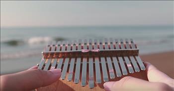 One woman performs a breathtaking rendition of ‘Oceans (Where Feet May Fail)’ using a kalimba. 

This particular Christian song has become a sensation across the world. Originally recorded by Hillsong UNITED, one of the top Christian groups of the modern era, ‘Oceans (Where Feet May Fail)’ is now a staple in worship services all over the globe. 

“You call me out upon the waters 
The great unknown where feet may fail 
And there I find You in the mystery 
In oceans deep 
My faith will stand” 

Today, Karina Javier is putting her own unique spin on this beloved tune. She utilizes the kalimba, an African musical instrument, to create this incredible instrumental sound. 

As you listen to these sweet notes, you will be reminded of the love and mercy that comes from our Father in Heaven. No matter the time or distance, God will always be right there to welcome us home. 

“And I will call upon Your name 
And keep my eyes above the waves 
When oceans rise, my soul will rest in Your embrace 
For I am Yours and You are mine” 

Psalm 150:1-5 “1 Praise the LORD.Praise God in his sanctuary; praise him in his mighty heavens. 2 Praise him for his acts of power; praise him for his surpassing greatness. 3 Praise him with the sounding of the trumpet, praise him with the harp and lyre, 4 praise him with timbrel and dancing, praise him with the strings and pipe, 5 praise him with the clash of cymbals, praise him with resounding cymbals.”

