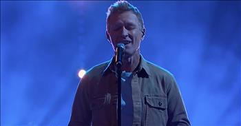 Country singer and songwriter Craig Morgan performs an emotional rendition of his song "The Father, My Son and The Holy Ghost" that brings everyone to tears. 

In 2016, this country superstar experienced a huge loss when his 19-year-old son, Jerry, died in a boating accident. The unexpected death sent shockwaves through The Morgan Family. But three years later, Craig was able to put some of his deep emotions into a song. 

“I cried and cried and cried until I passed out on the floor 
Then I prayed and prayed and prayed till I thought I couldn't pray anymore 
And minute by minute, day by day, my God, He gave me hope 
I know my boy ain't here but he ain't gone” 

While a guest on The Kelly Clarkson Show, Craig described how the lyrics of the song came to him in the middle of the night. He got up from his bed and it took him less than four hours to finish the entire song. But Craig was unsure if he would ever be able to actually sing the heartfelt words in public.

 He debuted the song at the Grand Old Opry and barely made it to the end without breaking down. That’s when he encountered Ricky Skaggs backstage who told him that the world needed to hear these words.

“In the mornings I wake up, give her a kiss, head to the kitchen 
Pour a cup of wake-me-up and try to rouse up some ambition 
Go outside, sit by myself but I ain't alone 
See, I've got the Father, my son, and the Holy Ghost”

Many people were touched by these rare and real lyrics. One person who was hit hard by the words was fellow country star Blake Shelton. After hearing the song, he was moved to make a post on Twitter. 

Even though Blake currently held the number one spot on the iTunes chart, he wanted to help "The Father, My Son and The Holy Ghost" take over. He encouraged his fans and other celebrities to purchase the song and it eventually went number one across the board. 

Now, Blake is sitting in the audience as Craig performs this incredible song on The Kelly Clarkson Show. I don’t think there was a dry eye in the place by the end.  
