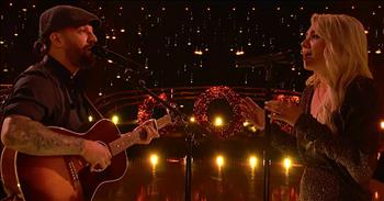 Former Dancing With The Stars pro Mark Ballas steps on stage with his wife for a stunning rendition of ‘O Holy Night.’ 

This beloved Christmas song is a favorite by so many. The touching tune and powerful lyrics truly put us in the Christmas spirit. 

“O holy night the stars are brightly shining 
It is the night of our dear Savior's birth 
Long lay the world in sin and error pining 
Till He appeared and the soul felt its worth”

For years, Mark Ballas and his wife, BC Jean, have been touring the country as the vocal duo Alexander Jean. Today, they are back with fellow Dancing With The Stars cast members Derek and Julianne Hough for their television special, Holidays With The Houghs. 

As they step on stage with just a microphone and guitar, this married couple beautifully belts out the words to ‘O Holy Night.’

“Fall on your knees 
O hear the angels' voices 
O night divine 
O night when Christ was born 
O night divine o night 
O night divine”

Christmas is truly the time of year when we come together with our family and friends to celebrate the birth of our Savior, Jesus Christ. A tiny baby born in a manger would go on to save us all. That is definitely something to sing about and the lyrics of ‘O Holy Night’ are the perfect way to give praise to His Name. 

Who else is singing along as Alexander Jean performs this stunning rendition of the classic hymn?
