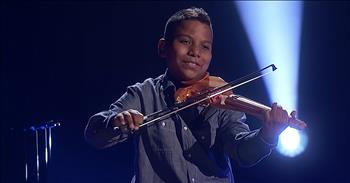 Talented teen violinist Tyler Butler-Figueroa returns to the America’s Got Talent stage with an incredible performance of ‘What A Wonderful World.’ 

We first met this talented young man when he auditioned for the fourteenth season of America’s Got Talent. I think the whole world’s heart melted when they heard his touching backstory and watched his incredible performance. 

Tyler started to play the violin at the age 7, after he nearly lost his life to cancer. His treatments caused him to lose his hair and he immediately became a target for bullies. But music, and the violin, gave Tyler an outlet and he started to gain confidence and come out of his shell. 

His performance of ‘Stronger’ from Kelly Clarkson led judge Simon Cowell to press the golden buzzer. Tyler made it all to the finals with his impressive violin performances getting better and better each week. 

Now, Tyler is back on the stage that started it all as a semi-finalist contestant on America’s Got Talent: The Champions. This popular competition features over 40 acts from the entire Got Talent franchise. 

The list of contenders includes past winners, finalists and fan-favorites from all around the globe. And Tyler came to win with an amazing performance of ‘What A Wonderful World.’ 

The judges raved about this semi-final performance. Howie Mandel said, “It was absolutely beautiful and emotional and captivating.” 

This young man truly has the talent to go all the way. Who are you rooting for on this season of America’s Got Talent: The Champions?
