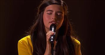 13-year-old Angelina Jordan returns to the America’s Got Talent stage with a unique rendition of ‘Goodbye Yellow Brick Road’ by Elton John. 

We first met Angelina back in 2014 on Norway’s Got Talent. This hypnotic crooner was just 8 years old when she named the winner the entire season. Her powerful voice and unbelievable performances racked up millions of views online. 

Angelina is best known for singing classic jazz tunes such as ‘Fly Me To The Moon’ and ‘Summertime.’ And now, she’s bringing her talents to the USA as a contestant on America’s Got Talent: The Champions. 

The popular competition features over 40 acts from all over the globe. During Angelina’s first performance, she belted out an incredible rendition of ‘Bohemian Rhapsody’ that earned the golden buzzer from judge Heidi Klum. Now, she’s pulling out all the stops for her semi-final performance of ‘Goodbye Yellow Brick Road.’ 

Just listen as she sings these classic Elton John lyrics.

“So goodbye yellow brick road
Where the dogs of society howl
You can't plant me in your penthouse
I'm going back to my plough
Back to the howling, old owl in the woods
Hunting the horny-back toad
Oh, I've finally decided my future lies
Beyond the yellow brick road”

After her performance, Angelina earned rave reviews from the judges. Heidi said, “I can feel it all the way down to my bones that you are a superstar in the making.” There’s no doubt that this young singer has what it takes to go all the way. But only time will tell if the viewers feel the same. 
