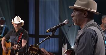 Country superstar Brad Paisley and Grammy award-winning blues artist Keb' Mo' come together for a beautiful performance of ‘Will The Circle Be Unbroken.’ 

This 1907 hymn was written by Ada R. Habershon with music by Charles H. Gabriel. For decades, this iconic song has touched hearts all around the world. 

“I said to the undertaker 
Undertaker please drive slow 
For this lady you are carrying 
Lord I hate to see her go”

Today, Brad Paisley and Keb’ Mo’ are putting their own spin on this classic hymn and it’s absolutely stunning. Brad Paisley is a country music legend with hit songs like ‘When I Get Where I'm Going’ and ‘Waitin’ On A Woman.’ 

He’s earned multiple Grammy, ACM, and CMA awards. Keb’ Mo’ is also a famed artist in the blues world. He started playing music in the 1970s and quickly made a name for himself as a talented singer and songwriter. 

Now, these two powerhouse musicians are coming together to perform ‘Will The Circle Be Unbroken’ live at the Grand Ole Opry.

“Will the circle be unbroken 
By and by, lord, by and by 
There's a better home a-waiting 
In the sky, lord, in the sky”

As our world faces challenging times, it is easy to focus on the negative. But it is so important to remember that God is always by our side and He is there to shoulder all of our burdens. Turn to Him in times of joy and sorrow and let His light shine through you. 
