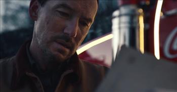 A 2020 Coca-Cola Christmas commercial is so heartwarming, it brings the tears to the eyes this holiday. 

Coca-Cola has been around for decades, and their commercials for the holidays can always be counted on to bring a bit of cheer..

Their ad this year begins with a little girl hugging her father before he goes away for work. But before he left she handed him a letter for him to send to the North Pole. The little girl’s dad worked at an offshore wind energy plant, and as he was eating his lunch he had noticed the letter for Santa that his daughter had given to him.

In a last minute effort to get the letter to the North Pole, the dad grabs a small speed boat to try to catch up with the mail boat that would deliver the mail across the ocean. But the dad’s engine burned out mid-chase. 

Now stranded at sea, he just sat and waited. While the dad was waiting in the middle of nowhere, a whale emerged from the water and splashed down causing the dad’s boat to capsize. While he was under water he made sure to keep a tight grip on his daughter’s letter to Santa, determined to deliver it no matter the cost.

The dad then woke up on a shoreline with the letter in hand, we then saw him sitting next to a fire holding and gazing at the letter. This is when the true adventure begins! The dad was so determined to deliver this letter for his little one that he had climbed cliffs, stumbled through swamps, walked through the thickest parts of the jungle.

When he finally arrived at the North Pole, a sign on the door had read “Closed for Christmas.” Dropping to his knees the father felt defeated, until the beam from headlights illuminated the dad’s face. A Coca-Cola semi-truck had pulled up, and the dad climbed in. It was a long journey but the driver transported him all the way back home.

When the dad got out of the truck, the driver handed him the letter he forgot in the cab of the truck. He took the letter and opened it, and it read “Dear Santa, Please Bring Daddy Home for Christmas.”

When the father got the letter, he was determined to deliver it no matter what, yet all his daughter wanted was for him to be home for Christmas. Coca-Cola has done it again with another amazing heart-tugging commercial. Watch it and feel your heart swell.
