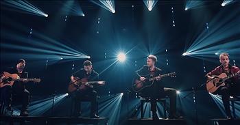 Be transported back in time as you listen to 40 Fingers perform a live rendition of ‘The Sound Of Silence.’

Simon & Garfunkel originally released this iconic song in 1964. Since that time, many artists have lent their voices to the tune. One of the most well known covers comes from the rock band, Disturbed, in 2015. 

Recently, a cappella group Pentatonix released their own version and it skyrocketed the tune back into popularity. Today, we’re hearing an entirely new rendition, with a nod to classical music, and it’s absolutely stunning. 

“Hello darkness, my old friend, I've come to talk with you again 
Because a vision softly creeping, Left its seeds while I was sleeping 
And the vision that was planted in my brain 
Still remains within the sound of silence” 

40 Fingers is a guitar quartet comprised of members Matteo Brenci, Emanuele Grafitti, Marco Steffè, Andrea Vittori. This talented group of musicians takes beloved classics and gives them a unique and instrumental makeover. 

From hits such as ‘Back In Black’ and ‘Bohemian Rhapsody,’ there is always something special about each arrangement from 40 Fingers. 

Today, they’re sharing a live performance of ‘The Sound Of Silence’ from a recent live stream concert and it’s absolutely chilling. From the melody to the twang of the strings, the performance is sheer perfection from beginning to end. 

It’s always hard to cover such a classic song, but the men of 40 Fingers definitely did the tune justice. 

What song are you hoping to hear next?
