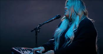 Up and coming gospel artist Anna Golden leads us in worship with her inspiring song, ‘Still God.’ Even in the midst of hardship, God is still there for us each step of the way and these words are the perfect reminder that He is around every corner.

“You’re still God in the waiting 
You’re still God in a storm 
You’re still God in the silence 
You’re still God when it’s hard”

Worship leader Anna Golden is no stranger to the stage. She comes from a family of talented artists, but she chose to use her gifts to glorify the Lord. Today, she is belting out the powerful words to ‘Still God’ and it’s a truly incredible performance. 

After this acoustic rendition, Anna also shares the story behind the song and how to play the chords on your own, at home. 

“You are Alpha, Omega, Beginning, and End
Savior, Messiah, Rose of Sharon
You are Healer, Redeemer, my closest friend 
You’re still God, when I don’t understand”

We all walk through difficult times in our live. There may be times of sadness or confusion and times of love and joy. No matter what, our God is always with us. He waits and welcomes us into His Home and that is such a beautiful reason to lift His Name in praise.

Revelation 21:6 “And he said to me, “It is done! I am the Alpha and the Omega, the beginning and the end. To the thirsty I will give from the spring of the water of life without payment.”
