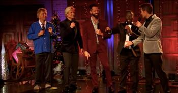 Check out the official lyric video by the Gaither Vocal Band for ‘Glorious Impossible / O Come, Let Us Adore Him.’
 
“See the Virgin is delivered in a cold and crowded stall, mirror of the Father's glory
Lies beside her in the straw, He is Mercy's incarnation, marvel at this miracle!
For the Virgin gently holds, the Glorious Impossible, Love has come to walk on water
Turn the water into wine, touch the leper, bless the children, love both human and divine
Praise the wisdom of the Father, who has spoken through His Son, speaking still
He calls us to the Glorious Impossible”
 
What a wonderful song, and the voices of the Gaither Vocal Band are just incredible! They all sound so good individually and even better together! And their harmonies sound amazing throughout the song.
 
In the video, the group is surrounded by Christmas décor and there are lights all around the stage. The joyful sound and message of the song reminds us about the true reason for the holiday season.
 
While the Gaither Vocal Band is singing ‘Glorious Impossible,’ there is a chorus of singers on the side of the stage. And they almost sound like angels singing in the background! Later in the song, the singers transition to singing the Christmas hymn ‘O Come Let Us Adore Him.’ It is incredibly beautiful to hear and just warms your heart to listen to the music!
 
“The entire song is beautiful! But this last part was the icing on the cake!” <a href="https://www.youtube.com/watch?v=P0jxE0E1szw">comments</a> one person on YouTube after watching the video. “I heard it once, twice, three, ten times!”
 
“Just simply anointed! Thank you!” <a href="https://www.youtube.com/watch?v=P0jxE0E1szw">writes</a> another person online.
 
We hope that you enjoyed listening to the Gaither Vocal Band sing ‘Glorious Impossible / O Come, Let Us Adore Him’ and it was able to get you in the Christmas spirit!
