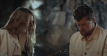 This couple has such intensity and amazing talent. Watch this video of “Worth It” by MŌRIAH and her Husband Joel Smallbone as they perform this worship song.

The video starts with MŌRIAH walking in her boots and holding a guitar, sitting down in front of a quarry in Nashville. We realize the location of the quarry as the backdrop is completely intentional as she sings about God breaking through the stone. 

She sings, “In my moment of shame you came to say that I am worth it.” Then, her husband Joel from the Christian band, “For King and Country,” begins singing the second verse and the couple makes stunning harmonies. They are accompanied solely by the simple guitar chords as MŌRIAH strums the instrument thoughtfully.

During the emotional performance, the two have a tone of seriousness and sincerity as they sing about Christ entering our sin and shame. They declare that He is our Healer. The song is a continual cry to the Lord to come into the broken places of our lives and meet us in our mess so that we can be healed and move forward. This married couple has beautiful harmony together in their voices and such authentic emotion.

“Worth It” reminds us that we are all sinners in need of God’s grace. He is capable of breaking through any heart of stone. He is able to break down the walls and carry us through. Jesus came so that we might have hope and redemption. When we place our faith in Jesus, we have eternal life with God forever. We no longer need to be ashamed of our sin because we have been fully forgiven.

“I will give them an undivided heart and put a new spirit in them; I will remove from them their heart of stone and give them a heart of flesh.” <a href="https://www.godtube.com/bible/ezekiel/11-19">Ezekiel 11:19</a>
