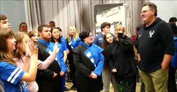 In an act of kindness, country star Vince Gill gifts new instruments to band students after a devastating flood.
 
Waverly, Tennessee had over 17 inches of rain in 8 hours over the summer, and the floods caused devastating damage all over the community. Homes, businesses, and schools were destroyed, and it is taking a while for all the destruction to be repaired.
 
One man wanted to help lift the spirits of the community, and that person was country music star Vince Gill!
 
“You just sit there and shake your head,” said Vince Gill. “What can we do to help out?”
 
Since replacing band instruments at the junior and senior high school had a low priority after all the destruction that the floods left behind, Vince knew that he wanted to help out in that way. He was able to donate 40 boxed up shiny and new band instruments to the school, and all of the band students were extremely grateful!
 
During a time when these students are sleeping in borrowed beds and living in temporary places after their homes were destroyed, having these new instruments to play really encouraged them during this difficult time.
 
The students learned about Vince Gill’s donation at a school assembly, and they were able to use the new instruments and play for the school.
 
“How delightful! A blessing from Vince Gill!” <a href="https://www.youtube.com/watch?v=o1bnPZbmfGM">comments</a> one person on YouTube after hearing about the story. “We need more musicians, celebrities, and companies to be this kind all of the time!”
 
“Wow! What a gift!! We need more great Americans like Vince,” <a href="https://www.youtube.com/watch?v=o1bnPZbmfGM">writes</a> another person online.
 
Vince goes on to talk about kindness and how important it is to show to others. “I often feel like we should be like this all the time, you know. That’s my dream,” he shares. “Let’s not just be kind when somebody’s struggling, let’s just be kind.”
 
God bless Vince Gill and his generosity to these music students!
