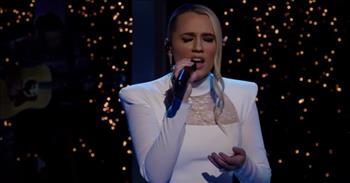 Check out this beautiful performance of the Christmas hymn ‘Silent Night’ from country star Gabby Barrett.
 
“Silent night, holy night! All is calm, all is bright.
Round yon Virgin, Mother and Child, Holy infant so tender and mild,
Sleep in heavenly peace, sleep in heavenly peace”
 
The music video shows Gabby Barrett performing ‘Silent Night’ at this year’s CMA Country Christmas Show. It is a beautiful rendition of the classic hymn with just clear vocals and a single guitar. The performers are surrounded by Christmas trees all lit up around the stage, and it is a magical sight.
 
The singer Gabby Barrett is an American country music artist, and she was the third finalist on the sixteenth season of American Idol.
 
As for the Christmas hymn ‘Silent Night,’ it was first sung on Christmas Eve 1818, in the church of St. Nicholas in Oberndorf near Salzburg. The words of ‘Silent Night’ were written by Rev. Joseph Mohr, a young priest in Oberndorf. He wrote them in 1816 as a reflection on peace after a summer of violence in Salzburg. Two years later, Joseph Mohr asked his friend Franz Xaver Gruber, a schoolteacher and organist, to set his words to music.
 
When Joseph and Franz performed ‘Silent Night’ for the first time in 1818 at Christmas Eve Mass, it was an instant hit. The Christmas carol has now been translated into over 300 languages, and the first English translation appeared in New York City in 1851.
 
We hope that you enjoyed listening to this video of country star Gabby Barrett singing ‘Silent Night’ this holiday season!
 
<a href="https://www.godtube.com/bible/matthew/2-11">Matthew 2:11</a>
And going into the house they saw the child with Mary his mother, and they fell down and worshiped him. Then, opening their treasures, they offered him gifts, gold and frankincense and myrrh.
