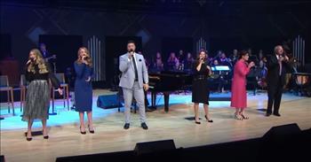 <p>Listen to The Collingsworth Family sing the uplifting song &lsquo;Right By Your Side&rsquo; in this energetic performance.</p>

<p>&ldquo;There are times in this life we live, things don t go the way we planned<br />
And I&rsquo;m tempted to murmur, complain, tell my troubles, heartaches, sorrow, pain.<br />
But then I lift up my eyes and see, there is hope waiting just for me<br />
The very moment I call upon his name Jesus reaches down and takes my hand.&rdquo;</p>

<p>What a wonderful song that showcases the group&rsquo;s incredible vocals and harmonies. And on stage with the singers, a piano and full band is playing behind them. There is even a fabulous trumpet solo later in the song.</p>

<p>&ldquo;Fabulous! My favorite styles/genres together - 40's jazz and gospel Music doesn't get much better than this,&rdquo; comments one person online after watching the video. &ldquo;Thank you Collingsworth family - God bless you and yours!&rdquo;</p>

<p>&ldquo;Great message for these troubled times. Absolutely beautiful harmony and choice of genre,&rdquo; another person writes on YouTube. &ldquo;Couldn't help being uplifted by this great presentation.&rdquo;</p>

<p>The Collingsworth Family is a Southern Gospel group that was started by Phil and Kim Collingsworth and features their family as the group. In this video, The Collingsworth Family is performing &lsquo;Right By Your Side&rsquo; at Liberty University's Center For Music And Worship Arts in&nbsp; Lynchburg, VA.</p>

<p>The song &lsquo;Right By Your Side&rsquo; is a new single for the family group, and it is a powerful song that is sure to uplift your spirit. It is the kind of song that puts a spring in your step and a smile on your face!</p>

<p>We hope that you enjoyed listening to The Collingsworth Family perform the song &lsquo;Right By Your Side&rsquo; today!</p>

<p><a href="https://www.godtube.com/bible/acts/17-27"><u>Acts 17:27</u></a> That they should seek God, in the hope that they might feel their way toward him and find him. Yet he is actually not far from each one of us,</p>
