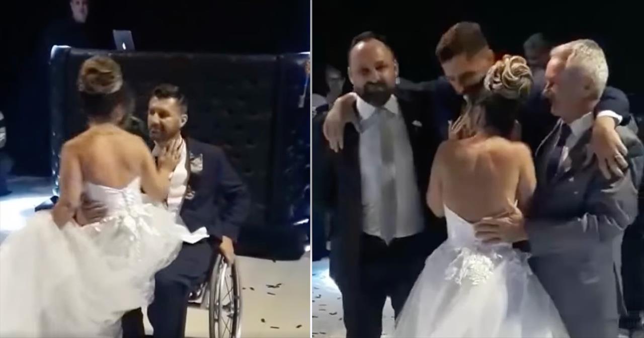 Groomsmen Help Groom Stand Up So He Can Dance With His Bride