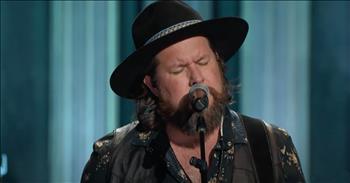 <p>Contemporary Christian artist Zach Williams visits the Grand Ole Opry for a special performance of &lsquo;Heaven Help Me.&rsquo;&nbsp;</p>

<p>These inspiring words remind us that there is no obstacle too big for us to overcome when God is by our side.</p>

<p>&ldquo;When I can't find the words<br />
When I can barely breathe<br />
I'm falling on my knees<br />
Heaven help me, Heaven help me&rdquo;</p>

<p>Zach Williams rose to fame with his worship anthem, &lsquo;Chainbreaker.&rsquo; After years as a heavy rocker and drug addiction, Zach found his way to God. From that moment on, he started to use his gift of music to give praise to the Lord&rsquo;s Name.</p>

<p>Today, he is at the Grand Ole Opry for a powerful performance of his single, &lsquo;Heaven Help Me.&rsquo; Just listen as he belts out these lyrics that call on our Father in Heaven.&nbsp;</p>

<p>&ldquo;Help me, help me, 'Cause I can't walk this road alone<br />
And I can't do this on my own&nbsp;<br />
Tell me, tell me, I just need to hear You say<br />
That everything will be okay&rdquo;</p>

<p>Zach shared the heart behind the song with <a href="https://freeccm.com/2021/09/22/behind-the-song-zach-williams-shares-the-heart-behind-his-song-heaven-help-me/">CCM Magazine</a>. &ldquo;I think it&rsquo;s important for us to put ourselves in a place where we can surrender everything in our lives to Him and know that He&rsquo;s got it.&rdquo;</p>

<p>Even in the midst of life&rsquo;s challenges, we can find peace and help when we turn to God and hand Him our burdens. He will give us strength and comfort for the rest of our days.&nbsp;</p>

<p><a href="https://www.godtube.com/bible/philippians/4-7">Philippians 4:7</a> &ldquo;And the peace of God, which passes all understanding, shall keep your hearts and minds through Christ Jesus.&rdquo;</p>
