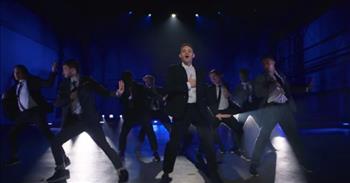 <p>Check out the official music video for the new song by Tauren Wells called &lsquo;Fake It.&rsquo;</p>

<p>&nbsp;&ldquo;I was chasing counterfeits, tryin to find a fix, but all that I was missing was You<br />
My hope was running out until you came around, and showed me<br />
There was nothing to prove, some would say it&rsquo;s unexplainable, but I know, yeah"</p>

<p>What an awesome and upbeat song that will have you wanting to dance as well as sing along when you hear it! There is so much joy in the song &lsquo;Fake It,&rsquo; and it serves as a reminder that true faith matters more than image.</p>

<p>"I know what You can do, You&rsquo;re changing my altitude, Your love is a whole new mood<br />
Something I can put my faith in, You struck a match in the dark<br />
You&rsquo;re melting my plastic heart, this is real don&rsquo;t have to fake it&rdquo;&nbsp;</p>

<p>Taren Wells <a href="https://www.klove.com/music/blog/new-music/your-new-favorite-song-now-tauren-wells-fake-it-with-k-love-first-2959">describes</a> the song as: &ldquo;A celebration of the real love of Jesus Christ that sets us free to be everything He has called us to be and nothing we are not. In other words, Jesus did not die for who we pretend to be, Jesus died for who we really are. That means, we don&rsquo;t have to 'fake It.' We don&rsquo;t have to fake our feelings, we don&rsquo;t have to fake our emotions, we don&rsquo;t have to fake our doubt, we don&rsquo;t have to fake our belief by wrapping it up in the trappings of tradition and religion. We get to come to Jesus as we are.&rdquo;</p>

<p>The dancing in the music video is also fantastic and has many people online praising Tauren for his sweet moves.</p>

<p>&ldquo;Keep glorifying the Lord through song and dance, brother! I love the choreography,&rdquo; <a href="https://www.youtube.com/watch?v=kAKofH6XfWs">writes</a> one person on YouTube after watching the music video. &ldquo;You are probably the only Christian artist to put out a fully choreographed music video in who knows how long... if ever. Thanks for giving me my God-glorifying dance fix.&rdquo;</p>

<p>We hope that you enjoyed listening to &lsquo;Fake It&rsquo; by Tauren Wells today, and may the song serve as a reminder to you that Jesus didn&rsquo;t die for the image that we project. He died for who we really are. So, there is no impressing him because we are already so loved!</p>
