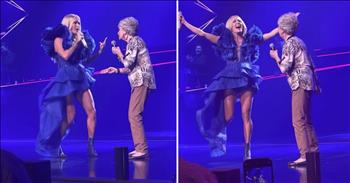 <p>Superstar Carrie Underwood performs a special duet of &lsquo;All-American Girl&rsquo; with her mother.&nbsp;</p>

<p>Carrie Underwood became a household name after winning the fourth season of American Idol back in 2005. She won over the hearts of America with covers of songs such as Bonnie Raitt's "I Can't Make You Love Me" and &ldquo;Bless The Broken Road&rdquo; from Rascal Flatts.</p>

<p>After her win, she quickly climbed the country charts and made a solid name for herself in the country music world. It&rsquo;s been 15 years since that momentous audition and Carrie is still touching hearts all over the world.&nbsp;</p>

<p>Today, she&rsquo;s performing a very special rendition of her hit single &lsquo;All-American Girl.&rsquo; The song was originally released in 2007 and hit number one on the Hot Country Songs chart. Written by Carrie Ashley Gorley and Kelley Lovelace, the song tells the story of the &lsquo;All-American&rsquo; girl from her birth up until she is married and having a child of her own.</p>

<p>&ldquo;Now he's wrapped around her finger,<br />
She's the center of his whole world.<br />
And his heart belongs to that sweet little beautiful, wonderful, perfect all-American girl&rdquo;</p>

<p>This song is always a fan-favorite, so it is no surprise that it was part of the set list for Carrie&rsquo;s Reflections concert during her residency at Resorts World Las Vegas.&nbsp;</p>

<p>But recently, she invited a special guest onstage to help her perform the song. Carrie&rsquo;s mother walked on stage and she actually gets her own mic and sings along with these iconic words.&nbsp;</p>

<p>And the moment truly resonated with the audience because videos of the March performance quickly went viral across social media.&nbsp;</p>

<p>It&rsquo;s always a welcome treat to see celebrities honoring their family in amazing ways like this.</p>

<p><em><a href="https://www.godtube.com/bible/exodus/20-12">Exodus 20:12</a> &ldquo;Honor your father and your mother: that your days may be long on the land which the LORD your God gives you.&rdquo;</em></p>
