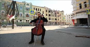 <p>Check out this incredibly resilient musician. This cellist plays a haunting tune on the damaged streets in Ukraine.&nbsp;</p>

<p>He sits in a chair in the middle of empty streets that tell the horrors of war. The once vibrant city that was full of life is now a shell of what it once was.&nbsp; As he plays the tune created by Bach via the Cello in C five minor, the classic world-renowned piece fills the warzone. The only other sound to be heard is the wind with the expectation of a passing car.&nbsp;</p>

<p>Underneath the video, the cellist by the name of Akustikos Art Group writes, &ldquo;We&#39;ve all been at war for a month now. War is terrible, but we must not be afraid because the truth is on our side, and each of us can help in this struggle, in his own place. And it is especially important who is next to you.&rdquo; He adds his gratitude and wrote,&nbsp; &ldquo;I hug and thank those close people who made our project possible, Anna Kolomiytseva, Oleksandr Osipov Photography, God bless you!&rdquo;&nbsp;</p>

<p>We pray that those who have been affected by this war are blessed in immeasurable and in innumerable ways by our mighty God who has the power to protect, comfort, and keep the Ukrainians still living in the war zone safe. The video that was recently posted has already garnered over 4,000 views with many viewers leaving comments for God to continue to bless the Ukrainians.&nbsp;</p>

<p>One viewer wrote, &ldquo;Music is the refuge of the soul, both can&rsquo;t be destroyed, a cello is more powerful than a machine gun &hellip; keep playing my brave friend &hellip; you inspire and Bach redeems&hellip;&rdquo; Another wrote, &ldquo;Stay strong and thank you for sharing your courage. I can&#39;t imagine what you all are going through.&rdquo; However, most of the comments asked for God to bless them and keep them safe.&nbsp;</p>

<p>Their plight reminds us that no matter what tragedy or dark valley we walk through, the Lord is our mighty helper. And because he is on our side, we are reminded we are mere mortals and God is on our side.&nbsp;</p>

<p>Let us pray for the Ukrainians and let us pray for God to end the war. We hope you enjoyed this hauntingly beautiful and class piece.&nbsp;</p>

<p><em>&ldquo;So we can confidently say, &ldquo;&lsquo;The Lord is my helper; I will not fear; what can man do to me?&rsquo;&rdquo; <a href="https://www.godtube.com/bible/hebrews/13-6">Hebrews 13:6</a></em></p>
