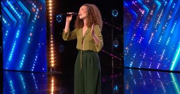 <p>This is a breathtaking video of a performance unlike any other. &#39;Never Enough&#39; Singer lived in the shadows, now she&#39;s a golden buzzer winner.</p>

<p>Simon asks Loren Allred why she has chosen to come to Britain&rsquo;s Got Talent if she is from Brooklyn, New York. She says, &ldquo;Most of my favorite singers are from the UK, so I thought I would come pay a visit to you guys.&rdquo; The crowd cheers.&nbsp;</p>

<p>When Simon asks her to share a little bit about herself, she says that she thinks a lot of them know her voice but not her face. She sang the song &ldquo;Never Enough&rdquo; from the Greatest Showman. The judges and audience are in total shock.</p>

<p>After all of this time singing behind the scenes, Loren is singing &ldquo;Never Enough&rdquo; live. As she begins, you can tell this is a nerve-wracking moment for her, but as the song goes on she completely blossoms and blows everyone away.&nbsp;</p>

<p>Her voice is incredible, it is rich, unique, and powerful. She has such a beautiful presence on stage. She hits unexpected notes that will shock you. When she finishes everyone stands and cheers and she gets the golden buzzer.&nbsp;</p>

<p>The judges share that they are shaking with excitement, it feels to them like a superstar has arrived, and that it was one of the most incredible auditions they have ever experienced.&nbsp;</p>

<p>This underdog story reminds us that our potential with God is endless. He has gifted us and created us for His glory and He is the one who gives us our &ldquo;big breaks.&rdquo; Whenever a door is opened before us, we can remember to always point to the Lord for His name&rsquo;s sake. Our lives have such amazing purposes because of our Savior.</p>

<p><em>&ldquo;Jesus looked at them and said, &ldquo;With man this is impossible, but with God all things are possible.&quot; <a href="https://www.godtube.com/bible/Matthew/19-26">Matthew 19:26</a></em></p>
