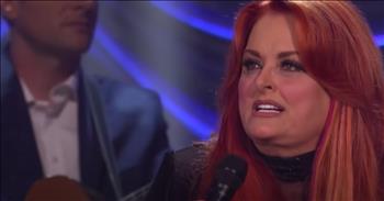 <p>Country star Wynonna Judd honors her late mother with a touching performance of &lsquo;Love Can Build A Bridge.&rsquo;</p>

<p>Wynonna and her mother, Naomi, released this hit song in 1990. Naomi even helped write the iconic number.&nbsp;</p>

<p>&ldquo;I would swim out to save you<br />
In your sea of broken dreams<br />
When all your hopes are sinkin'<br />
Let me show you what love means&rdquo;</p>

<p>While this song was originally written for the duo, Wynonna is on stage by herself. Sadly, Naomi Judd lost her battle with mental illness in April of 2022.&nbsp;</p>

<p>Her impact on the country music world went beyond just records. As the matriarch of The Judd family, she inspired millions of people all around the globe.</p>

<p>Today, Wynonna is celebrating her mother&rsquo;s life with a beautiful performance of &lsquo;Love Can Build A Bridge&rsquo; at the special memorial event, Naomi Judd: A River of Time Celebration.</p>

<p>Even though we have heard these words many times before, they hit differently this time.</p>

<p>&ldquo;Love can build a bridge<br />
Between your heart and mine<br />
Love can build a bridge<br />
Don't you think it's time? Don't you think it's time?&rdquo;</p>

<p>This emotional performance resonated with hearts all over the world. One viewer wrote, &ldquo;This song always hits home for me. This song has a whole new meaning to Wynonna now. Naomi was a beautiful song writer she was a beautiful woman I truly hope she is at peace.&rdquo;</p>

<p>Another said, &ldquo;The tears are flowing. What an amazing tribute to Naomi Judd. Mother, Wife, Icon.&rdquo;</p>

<p>I think we could all use a few tissues right now.&nbsp;</p>

<p><em><a href="https://www.godtube.com/bible/revelation/21-4">Revelation 21:4</a> &ldquo;And God shall wipe away all tears from their eyes; and there shall be no more death, neither sorrow, nor crying, neither shall there be any more pain: for the former things are passed away.&rdquo;</em></p>
