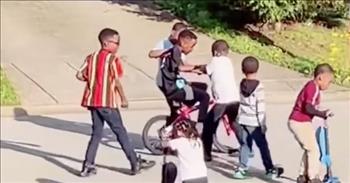 <p>Just when we think the world has forgotten what kindness means, a group of kids reminds us that using kindness is like riding a bike. You just have to keep trying with the support of a few friends. A mom captures a heart-warming video of neighborhood kids helping her little boy learn to ride a bike.&nbsp;</p>

<p>Tambria Currie&rsquo;s son Mykel wanted to learn how to ride a bike and has asked his mom for help. She said she would when she had time, but her son had other ideas. As all boys are, he didn&rsquo;t want to wait. He wanted to learn at that moment.&nbsp;</p>

<p>Uninhibited about asking for help, Mykel took to the neighborhood and asked his friends. In one incredible moment, all the kids came together to help Mykel get the hang of balancing on the bike and pedaling! Two kids helped him keep his balance while the rest surrounded him as he rode the bike down the street.&nbsp;</p>

<p>The moment was absolutely innocent, kind, and full of encouragement and Tambria captured it all on camera. She then posted it to Facebook with a note of wisdom that we can all use.&nbsp;</p>

<p>&ldquo;Mykel: Mommy, my friend, can ride a bike with no training wheels.</p>

<p>Me: Ima teach you one day.</p>

<p>My boy said forget that&hellip; Ima learn today. He went and asked for help and those babies helped with no problem. Didn&rsquo;t tease my baby or nothing. We can learn something from this generation. It&rsquo;s okay to ask for help. And it&rsquo;s definitely okay to help each other, encourage each other, and love each other.&quot;</p>

<p>It is more than okay to help each other. God commanded us to love each other, encourage each other, and build one another up just like these kids did for Mykel!</p>

<p><em><a href="https://www.godtube.com/bible/1-thessalonians/5-11">1 Thessalonians 5:11</a> &ldquo;Therefore encourage one another and build one another up, just as you are doing.&rdquo;</em></p>
