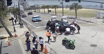 <p>Twenty people rush to lift a car off of a motorcyclist, Alex James. He had been out riding in Myrtle Beach, South Carolina when a distracted driver hit him from behind. This heart-stopping video will restore your faith in humanity that there are good samaritans out there.&nbsp;</p>

<p>In the video, you&rsquo;ll find Alex turning a corner with a friend on the back of his motorcycle; as they round the corner, a car hits them from behind. The woman on the back of the back feels the impact and rolls to get ground as she scrambles to get out of oncoming traffic.&nbsp;</p>

<p>At the same time, Alex is pinned under the car still on his motorcycle! Those who watched the accident unfold realize there is no time to waste. Immediately several people jump into action to try to lift the car while another samaritan contacts emergency services.&nbsp;</p>

<p>As bystanders watch, more and more jump in to lift the car off of Alex. Within a minute, twenty people are working together to give the car a good &lsquo;heave-ho&rsquo; to lift the car enough to pull Alex out from underneath.&nbsp;</p>

<p>Alex was released from the hospital and he is not only thankful for those who jumped in to save his life, but he&rsquo;s also &lsquo;grateful to the man upstairs&rsquo; for sparing his life and protecting him from what could&rsquo;ve been the end of his life. Alex also said that his bike can be replaced but he can&rsquo;t.&nbsp;</p>

<p>He knows he is incredibly blessed to live and tell the story of how strangers helped him in his time of need. We may not know what the day holds or what is around the corner, but God does and he is there protecting us and sending help every step of the way.&nbsp;</p>

<p><em><a href="https://www.godtube.com/bible/john/15">John 15:13-14</a> &ldquo;Greater love has no one than this, that someone lay down his life for his friends. You are my friends if you do what I command you.&rdquo;</em></p>

